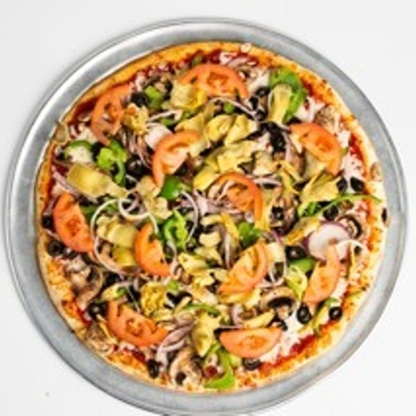 A whole vegetarian pizza with tomatoes, olives, peppers, onions, and artichoke hearts.